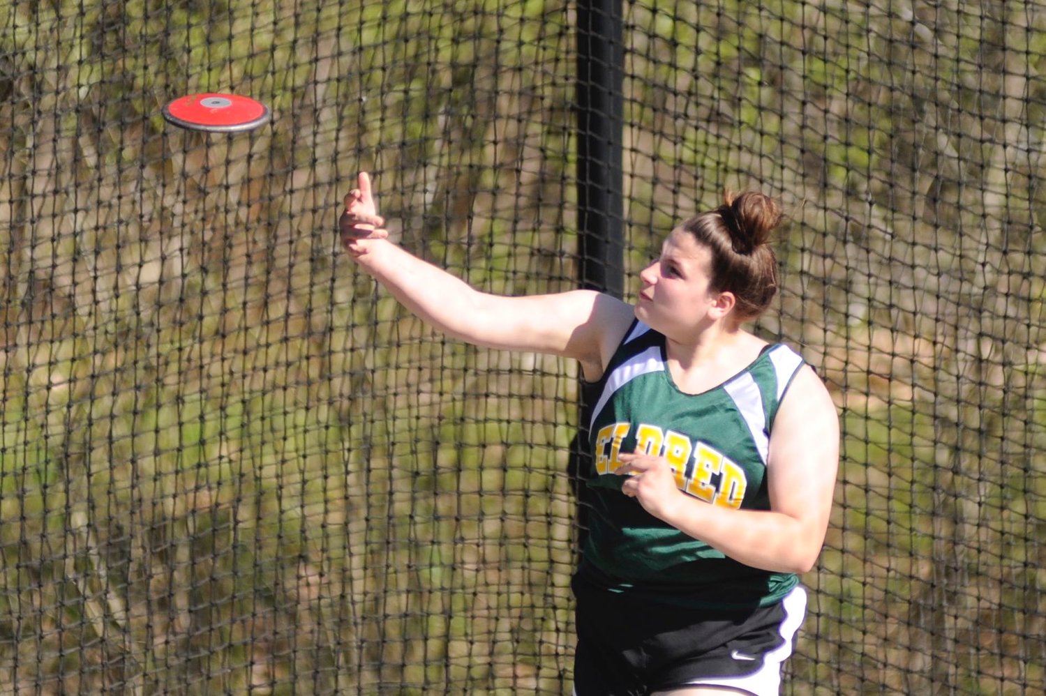 Flying saucer. Eldred’s Kesnia Sosnowski lets it fly in the discus event.